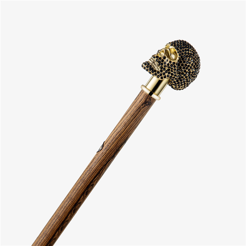 Black with drilling skull cane